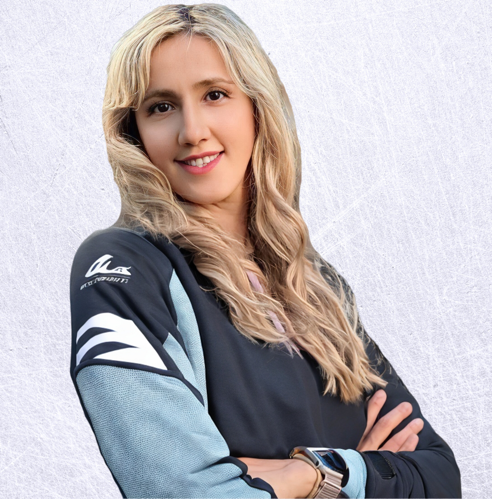 A person with long blonde hair
Description automatically generated