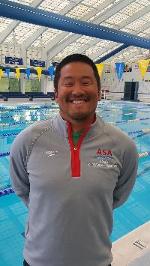 A person standing in a swimming pool
Description automatically generate